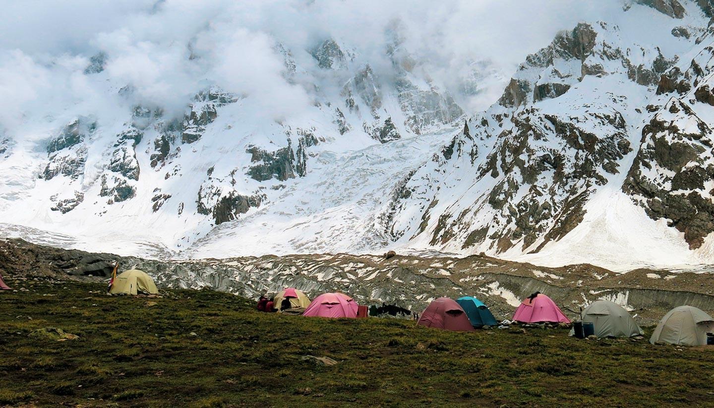snow-capped peaks in the backdrop, the Fairy meadows camping site.