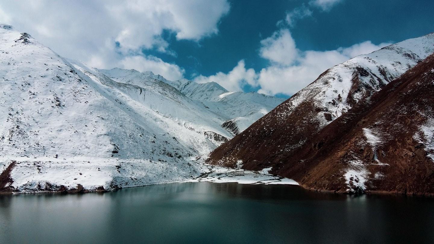 : The radiance of Lulusar Lake as the snow starts melting.