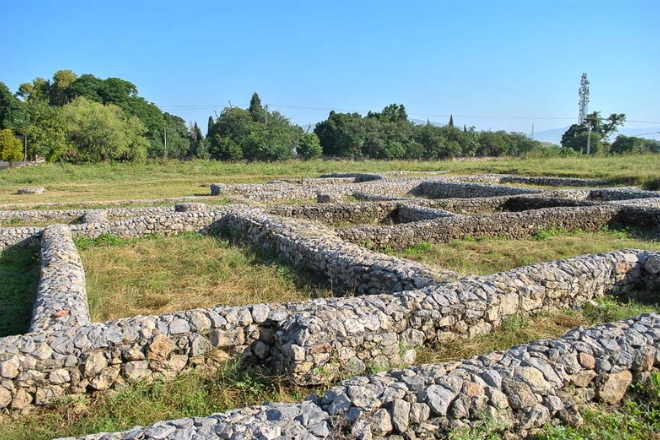 Stone foundations and monastery ruins at Taxila archaeological site