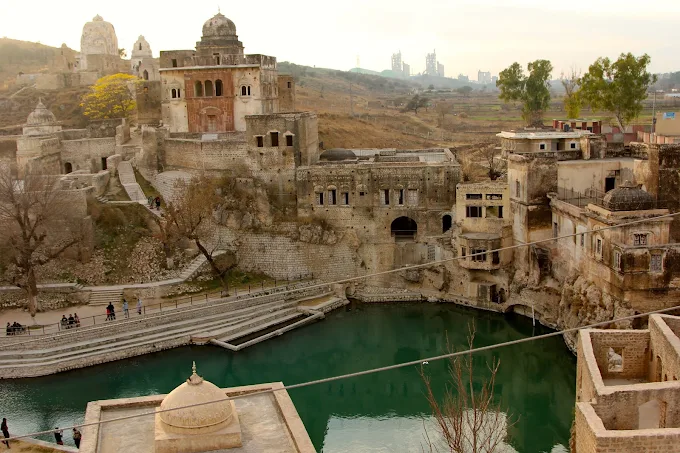 Sacred pond at Katas Raj Temples surrounded by stone steps
