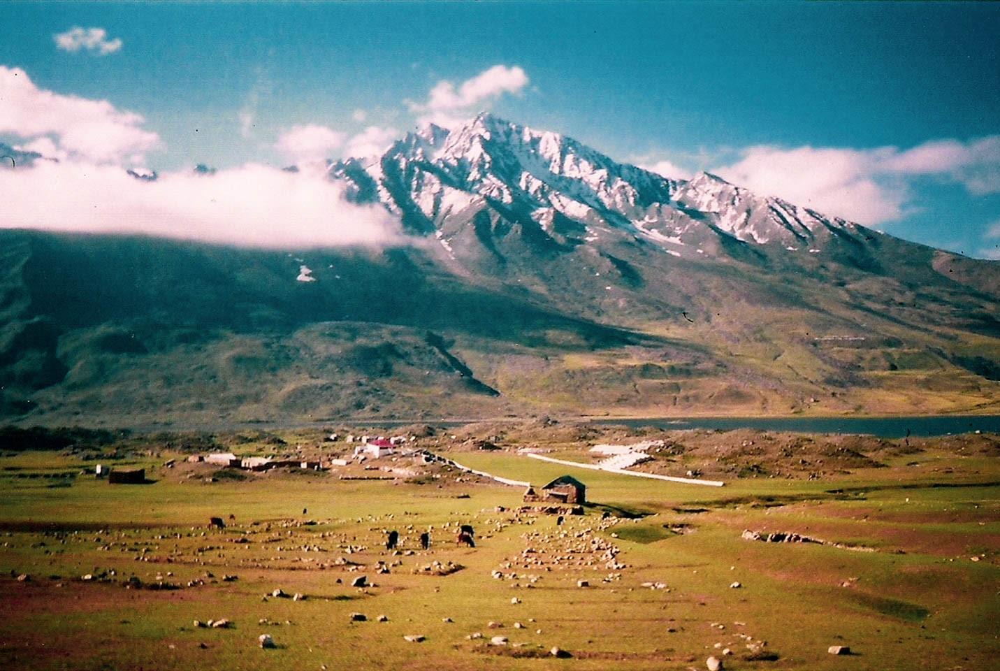 Shandur Pass plateau and polo ground surrounded by mountains
