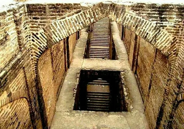 Stepped well (baoli) inside Rohtas Fort, showing tiered steps to water